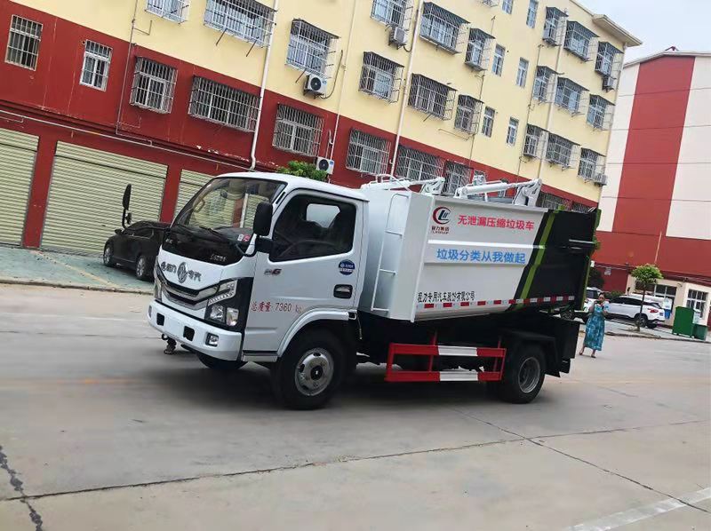 國(guó)六東風(fēng)多利卡7方自裝卸式垃圾車(chē)參數(shù)圖片介紹